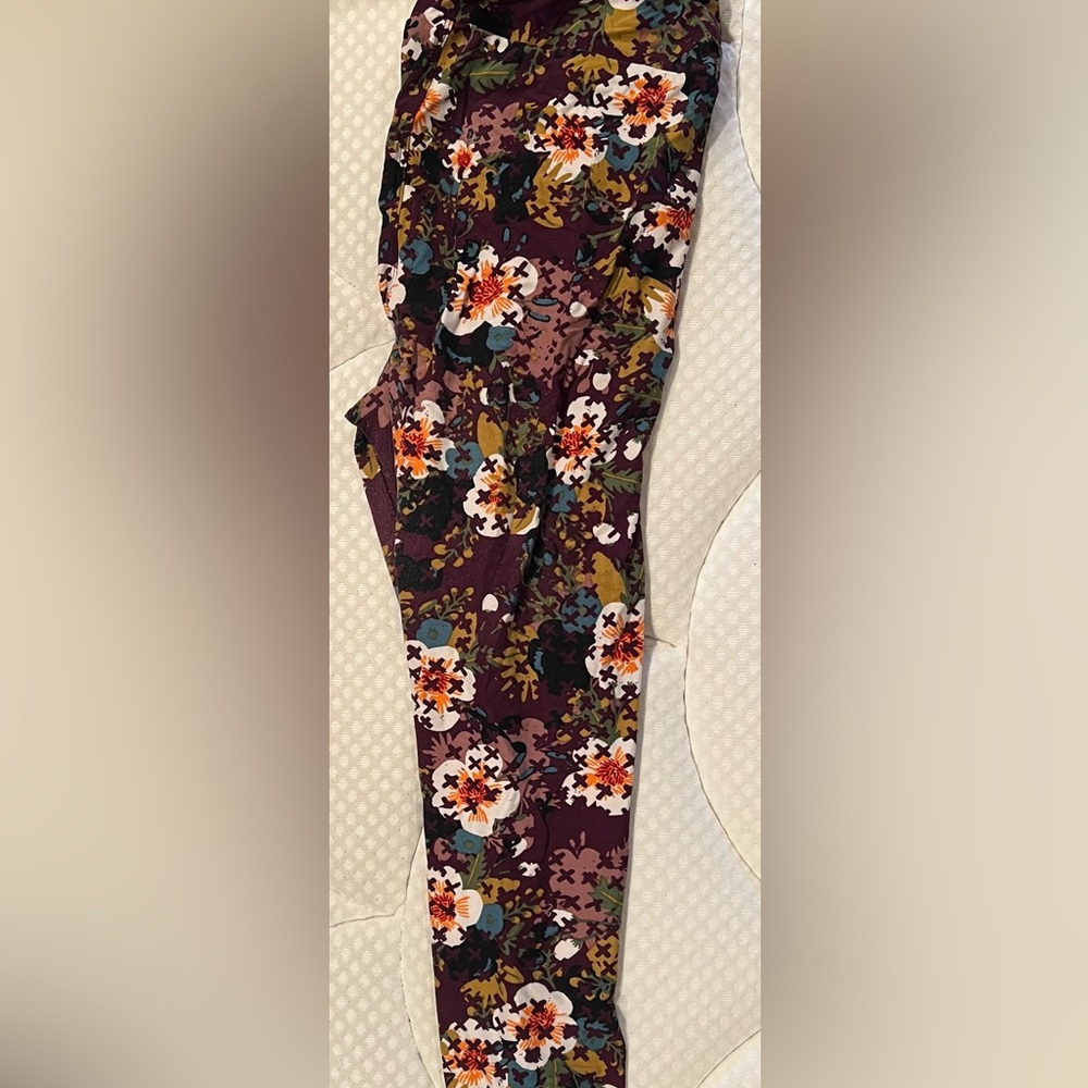 Purple floral LulaRoe leggings. Tall and curvy.